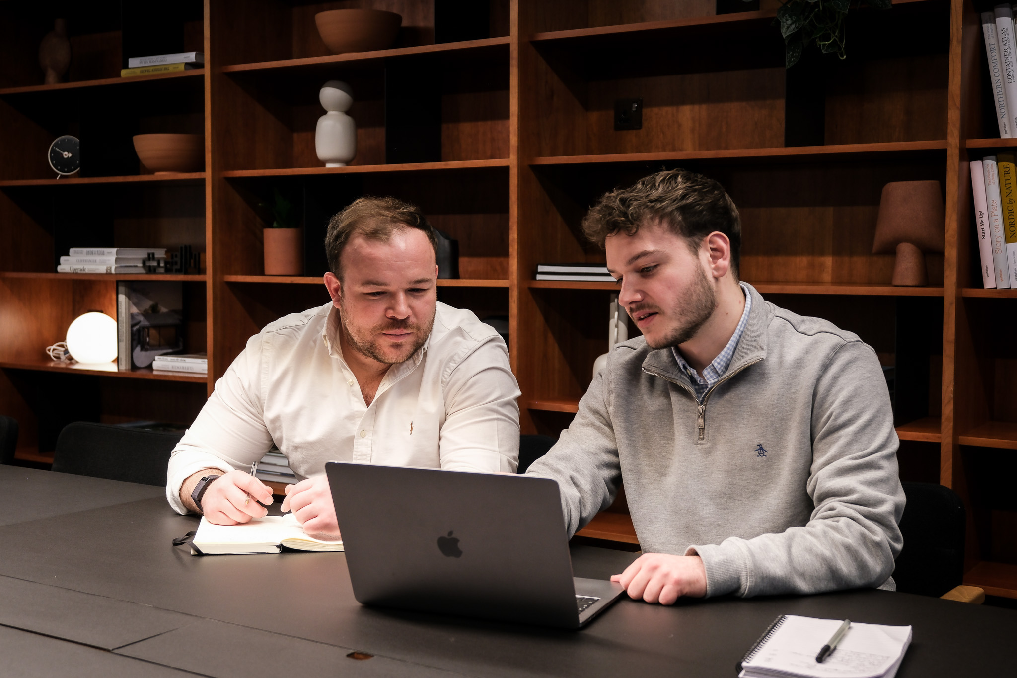Developers collaborating during implementation work